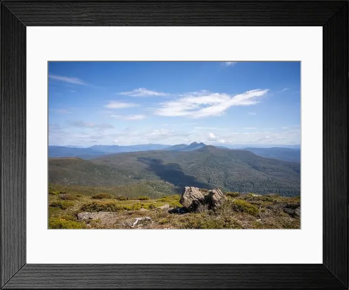 Framed Print : man hiking up a mountain with a backpack, alpine wilderness Framed Print : man hiking up a mountain with a backpack, alpine wilderness