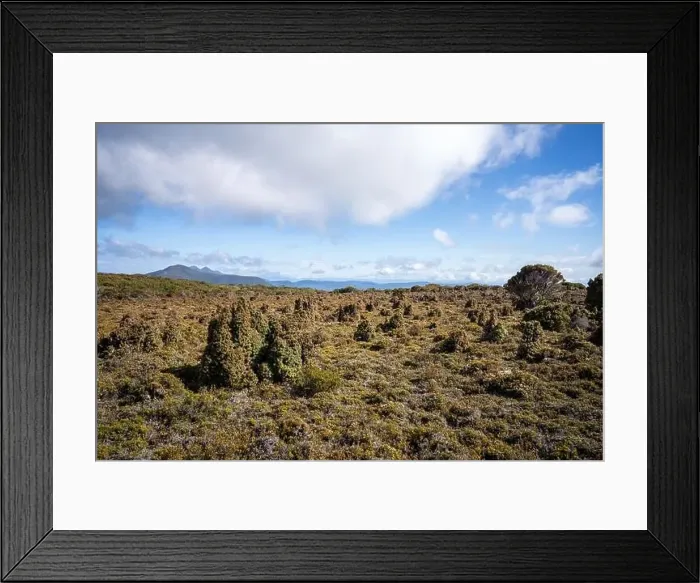 Framed Print : man hiking up a mountain with a backpack, alpine wilderness Framed Print : man hiking up a mountain with a backpack, alpine wilderness
