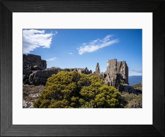 Framed Print : man hiking up a mountain with a backpack, alpine wilderness Framed Print : man hiking up a mountain with a backpack, alpine wilderness
