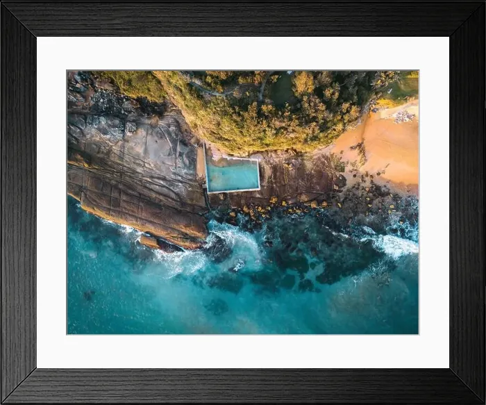Framed Print : Beach rock pool tidal pool built against the cliff in the rocks at the end of the beach for public swimming recreation Framed Print : Beach rock pool tidal pool built against the cliff in the rocks at the end of the beach for public swimming recreation