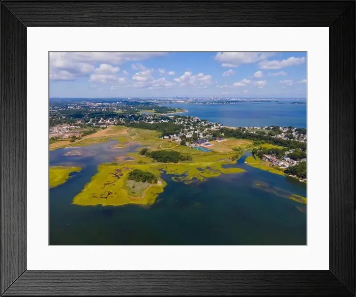 Framed Print : Town River Bay aerial view next to Quincy Bay with Boston modern skyline at the background in city of Quincy Framed Print : Town River Bay aerial view next to Quincy Bay with Boston modern skyline at the background in city of Quincy