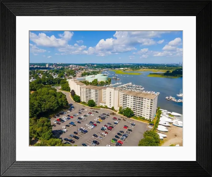 Framed Print : Town River Bay aerial view next to Quincy Bay with Boston modern skyline at the background in city of Quincy Framed Print : Town River Bay aerial view next to Quincy Bay with Boston modern skyline at the background in city of Quincy