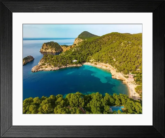 Framed Print : Aerial drone view of Cala Saladeta, Ibiza islands, Spain Framed Print : Aerial drone view of Cala Saladeta, Ibiza islands, Spain
