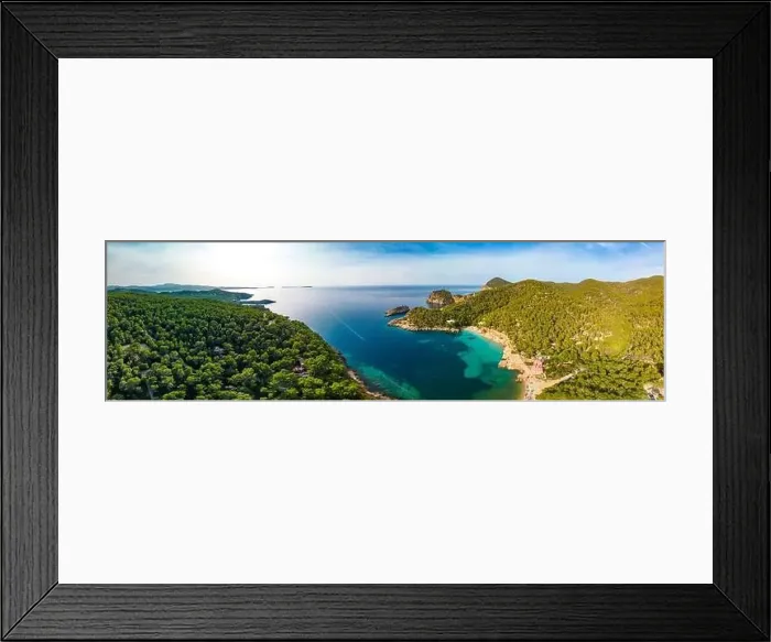Framed Print : Aerial drone view of Cala Saladeta, Ibiza islands, Spain Framed Print : Aerial drone view of Cala Saladeta, Ibiza islands, Spain