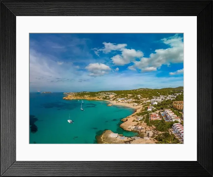 Framed Print : Aerial drone view of a beautiful coast and sea in Cala Tarida, Ibiza island, Spain Framed Print : Aerial drone view of a beautiful coast and sea in Cala Tarida, Ibiza island, Spain