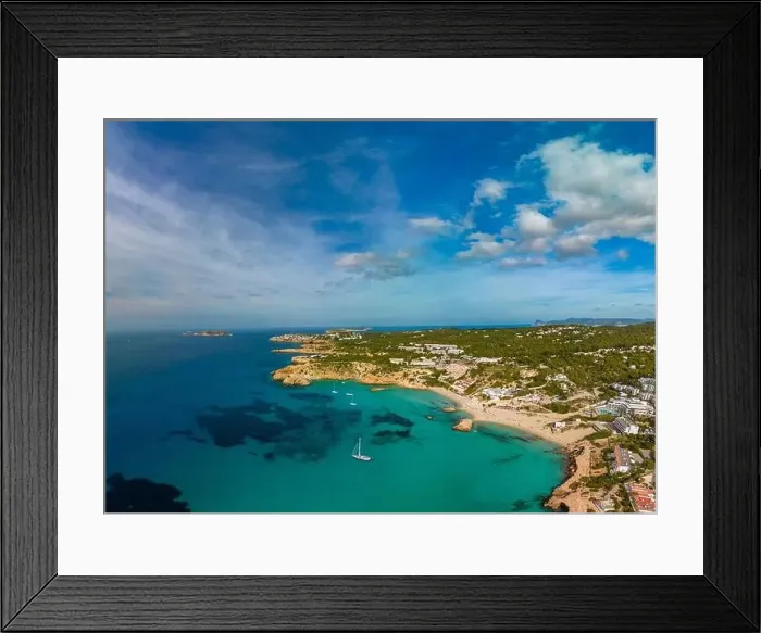 Framed Print : Aerial drone view of a beautiful coast and sea in Cala Tarida, Ibiza island, Spain Framed Print : Aerial drone view of a beautiful coast and sea in Cala Tarida, Ibiza island, Spain