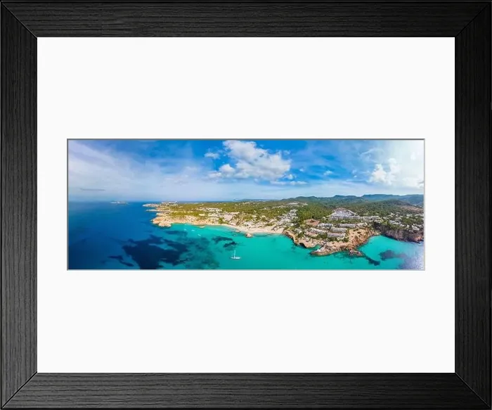 Framed Print : Aerial drone view of a beautiful coast and sea in Cala Tarida, Ibiza island, Spain Framed Print : Aerial drone view of a beautiful coast and sea in Cala Tarida, Ibiza island, Spain
