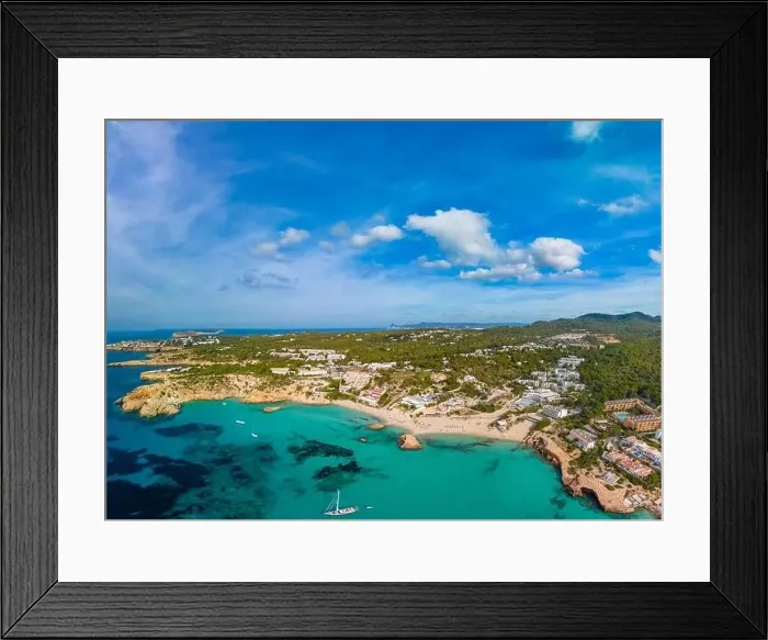 Framed Print : Aerial drone view of a beautiful coast and sea in Cala Tarida, Ibiza island, Spain Framed Print : Aerial drone view of a beautiful coast and sea in Cala Tarida, Ibiza island, Spain