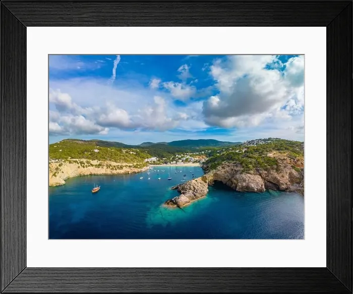 Framed Print : Aerial drone view of Cala Vadella, Ibiza islands, Spain Framed Print : Aerial drone view of Cala Vadella, Ibiza islands, Spain