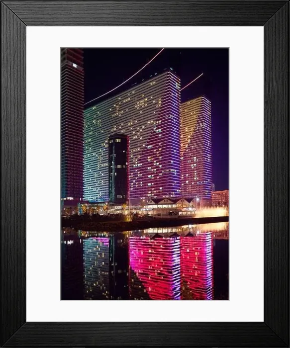 Framed Print : Night city of Batumi. Illuminated modern buildings at night Framed Print : Night city of Batumi. Illuminated modern buildings at night
