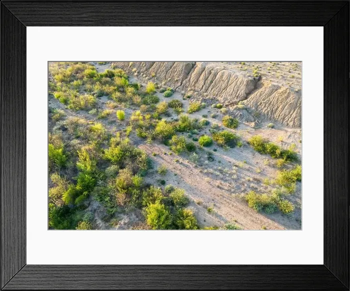 Framed Print : Aerial top view of sand quarry with green trees, slope of open pit Framed Print : Aerial top view of sand quarry with green trees, slope of open pit