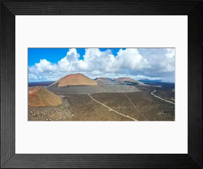 Framed Print : Volcanos in Timanfaya National Park on Lanzarote island travel aerial view panorama on Canary Islands in Spain Framed Print : Volcanos in Timanfaya National Park on Lanzarote island travel aerial view panorama on Canary Islands in Spain