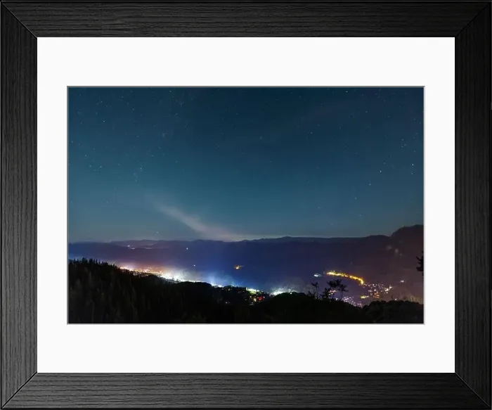 Framed Print : Night intermountain city of Smolyan with bright evening electric lights under a clear sky with bright small stars Framed Print : Night intermountain city of Smolyan with bright evening electric lights under a clear sky with bright small stars