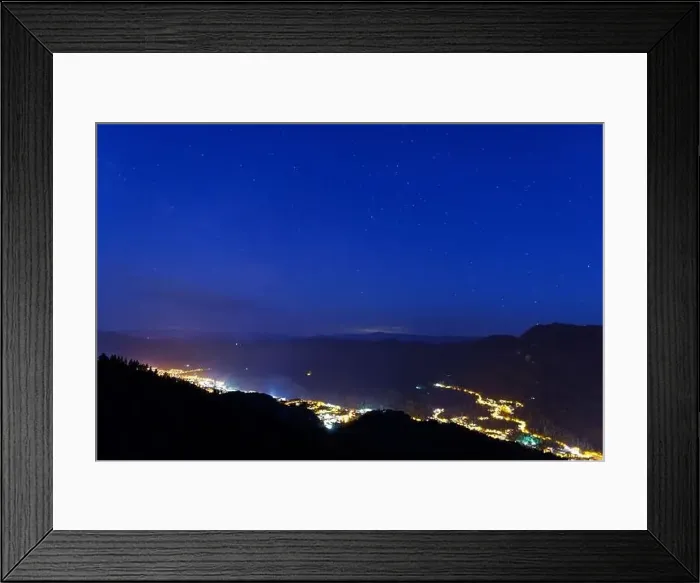 Framed Print : Night intermountain city of Smolyan with bright evening electric lights under a clear sky with bright small stars Framed Print : Night intermountain city of Smolyan with bright evening electric lights under a clear sky with bright small stars