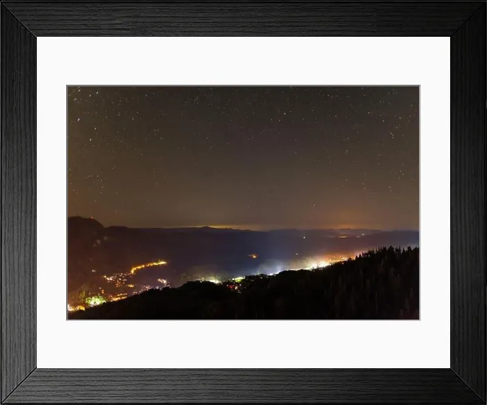 Framed Print : Night intermountain city of Smolyan with bright evening electric lights under a clear sky with bright small stars Framed Print : Night intermountain city of Smolyan with bright evening electric lights under a clear sky with bright small stars
