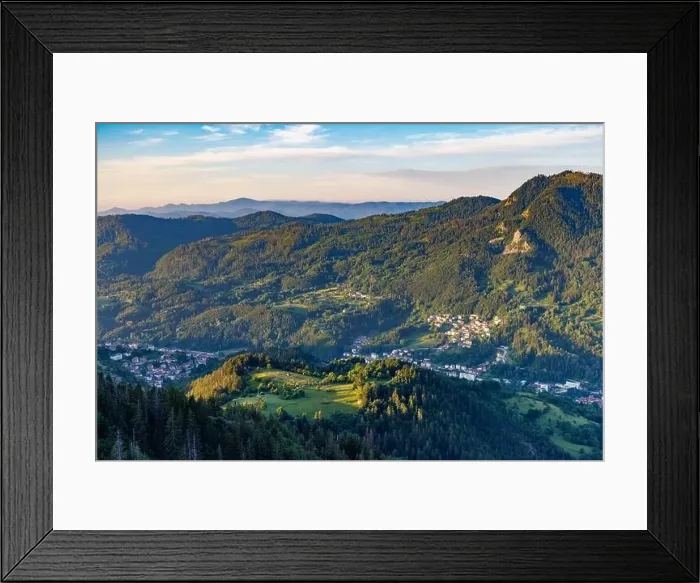 Framed Print : View from high rock to old village Smolyan with green meadows for cattle walking and houses Framed Print : View from high rock to old village Smolyan with green meadows for cattle walking and houses