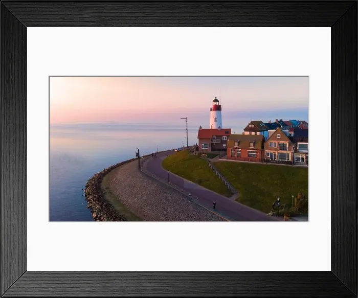 Framed Print : Drone view at Urk Flevoland Netherlands sunset at the lighthouse and harbor of Urk Holland