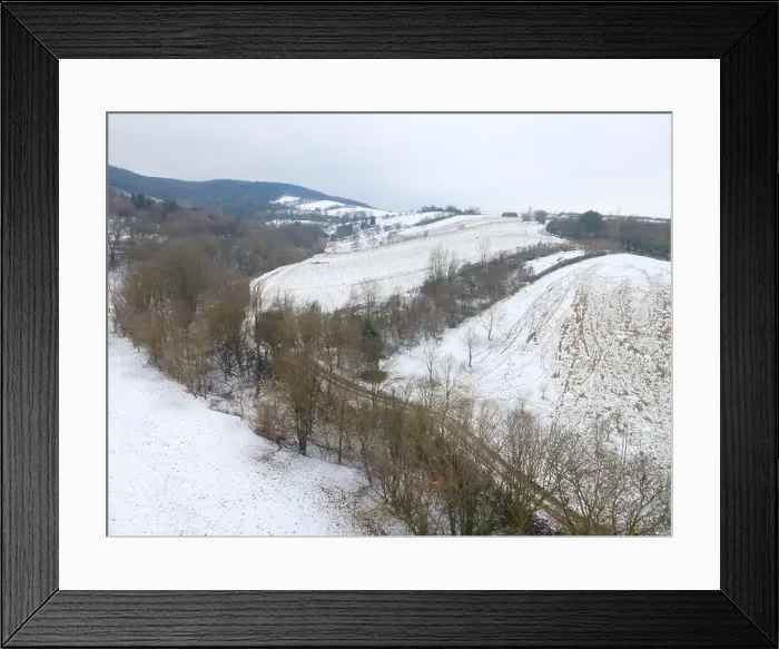 Framed Print : drone flight over landscape with very little snow Framed Print : drone flight over landscape with very little snow