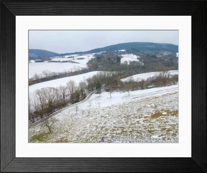 Framed Print : drone flight over landscape with very little snow Framed Print : drone flight over landscape with very little snow