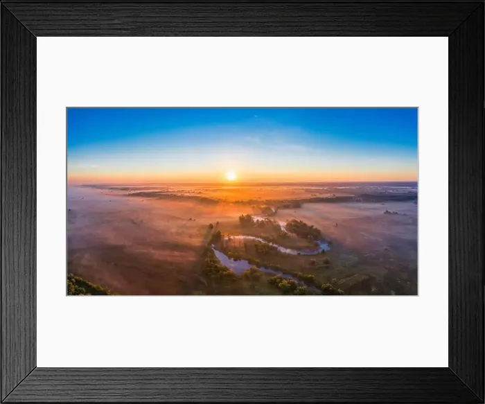 Framed Print : The channel and bends of the river, on a marshy meadow. Orange dry grass, scorched by the summer heat, and morning fog Framed Print : The channel and bends of the river, on a marshy meadow. Orange dry grass, scorched by the summer heat, and morning fog
