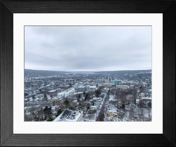 Framed Print : Afternoon winter aerial video of the area surrounding the City of Ithaca, NY, USA