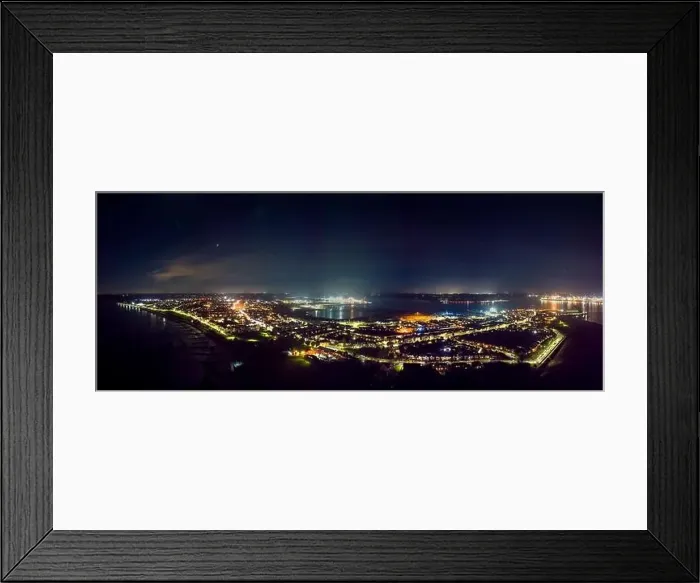Framed Print : An aerial view of the ports of Harwich and Felixstowe at night in the UK Framed Print : An aerial view of the ports of Harwich and Felixstowe at night in the UK