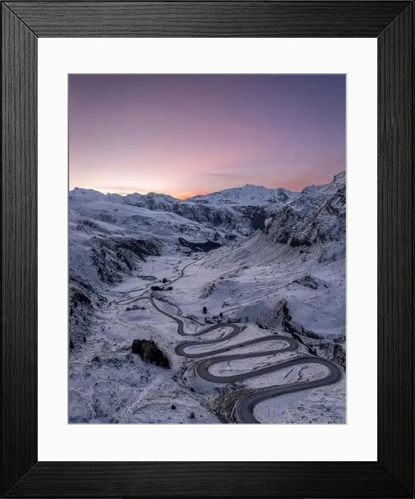 Framed Print : A snake shaped pass road in winter photographed from above Framed Print : A snake shaped pass road in winter photographed from above
