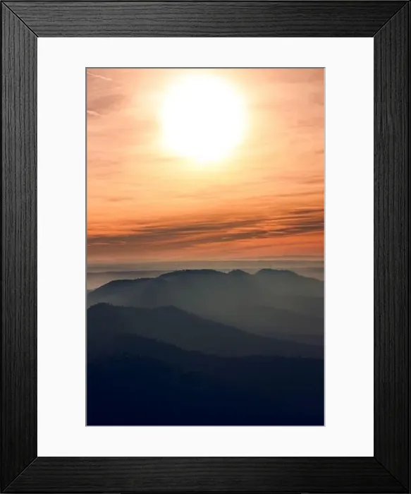 Framed Print : Drone view of picturesque scenery with bright sunset sky over foggy mountains and hills in Almatret Framed Print : Drone view of picturesque scenery with bright sunset sky over foggy mountains and hills in Almatret