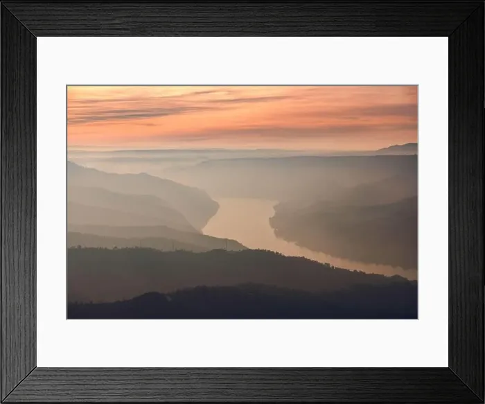 Framed Print : Drone view of picturesque scenery with bright sunset sky over foggy river and hills in Almatret Framed Print : Drone view of picturesque scenery with bright sunset sky over foggy river and hills in Almatret