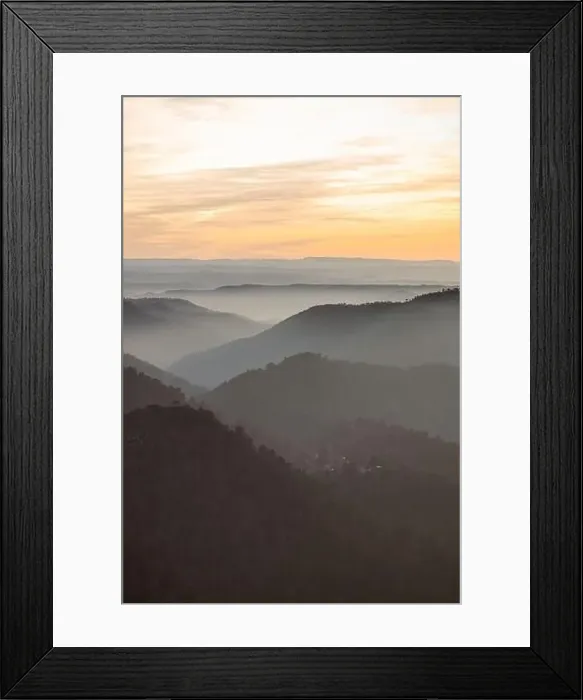 Framed Print : Drone view of picturesque scenery with bright sunset sky over foggy mountains and hills in Almatret Framed Print : Drone view of picturesque scenery with bright sunset sky over foggy mountains and hills in Almatret