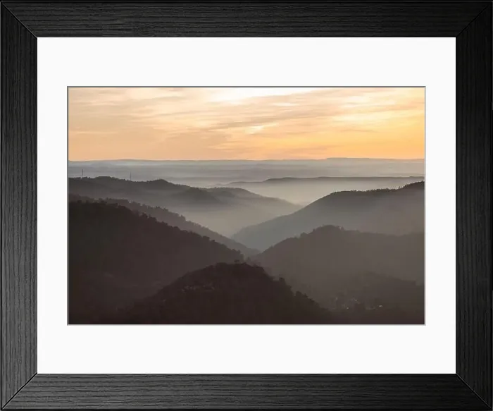 Framed Print : Drone view of picturesque scenery with bright sunset sky over foggy mountains and hills in Almatret Framed Print : Drone view of picturesque scenery with bright sunset sky over foggy mountains and hills in Almatret
