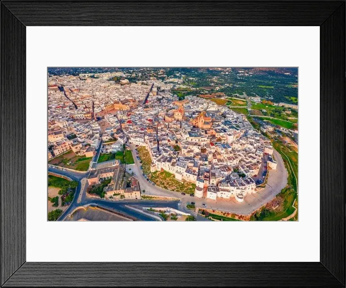 Framed Print : Aerial landscape photography. Colorful spring view from flying drone of Ostuni town Framed Print : Aerial landscape photography. Colorful spring view from flying drone of Ostuni town