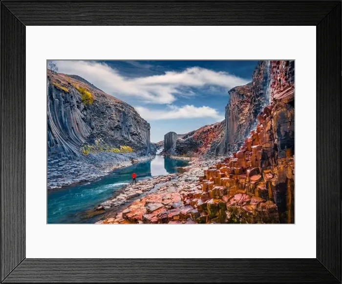 Framed Print : Tourist walking on the bottom of canyon with basalt columns Framed Print : Tourist walking on the bottom of canyon with basalt columns