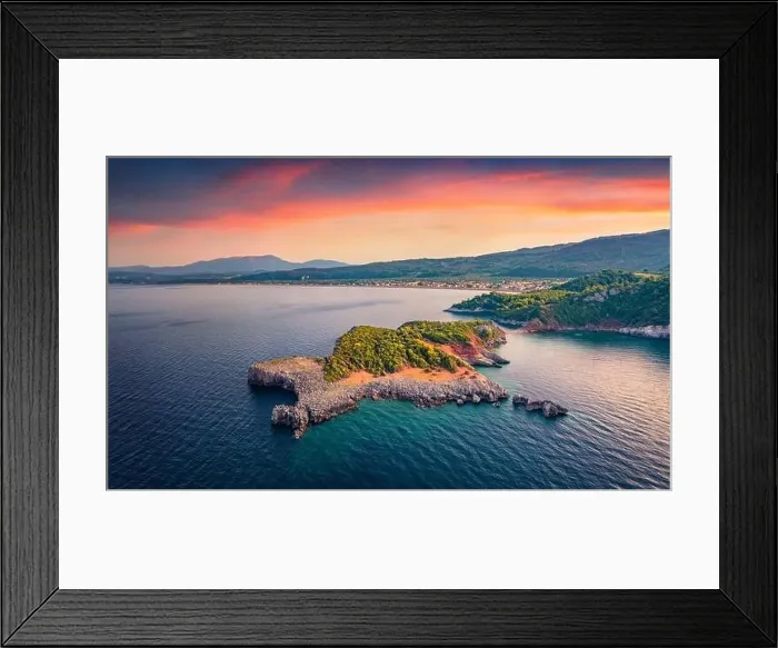 Framed Print : Stunning sunset on Saint Basil Beach with Agkali village on background Framed Print : Stunning sunset on Saint Basil Beach with Agkali village on background