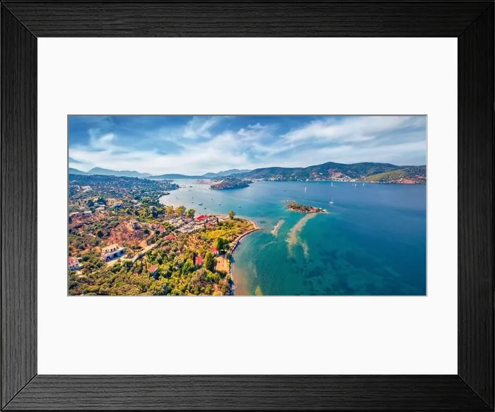 Framed Print : Fantastic summer view of Plaka beach and Poros town on background Framed Print : Fantastic summer view of Plaka beach and Poros town on background