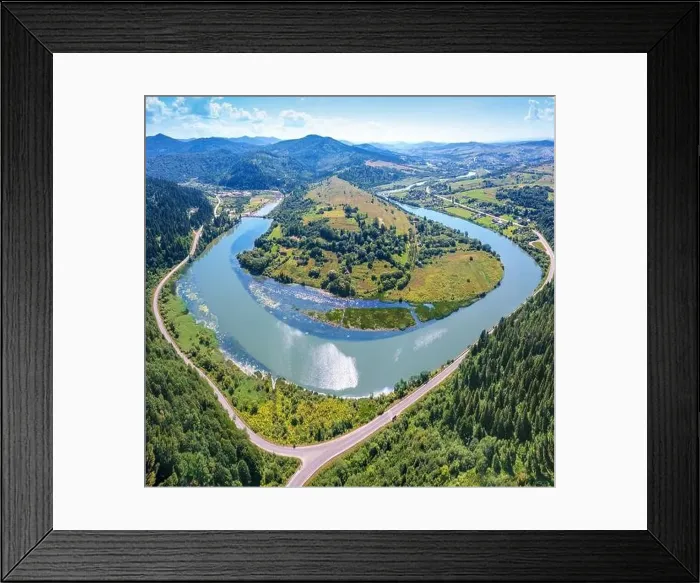 Framed Print : River meander in a mountain valley in summer. Drone view Framed Print : River meander in a mountain valley in summer. Drone view