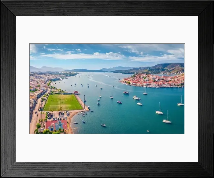 Framed Print : Collorful summer cityscape of Galatas town with public stadium