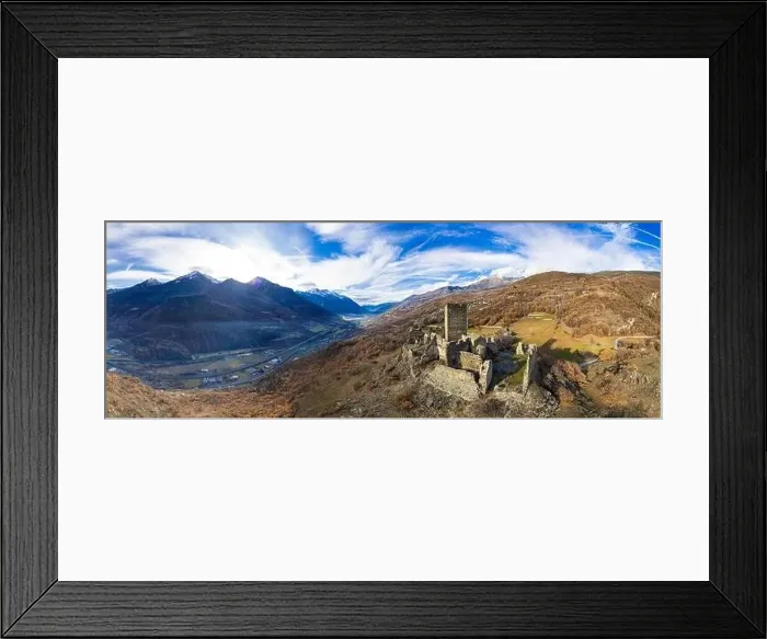 Framed Print : Medieval impressive castle Cly surrouded by Alps mountains in Valle d'aosta, Italy. aerial drone panoramic view Framed Print : Medieval impressive castle Cly surrouded by Alps mountains in Valle d'aosta, Italy. aerial drone panoramic view