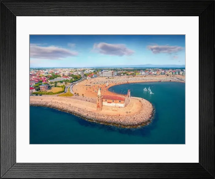 Framed Print : View from flying drone of Madonna dell'Angelo church - small seaside chapel & pilgrimage destination Framed Print : View from flying drone of Madonna dell'Angelo church - small seaside chapel & pilgrimage destination