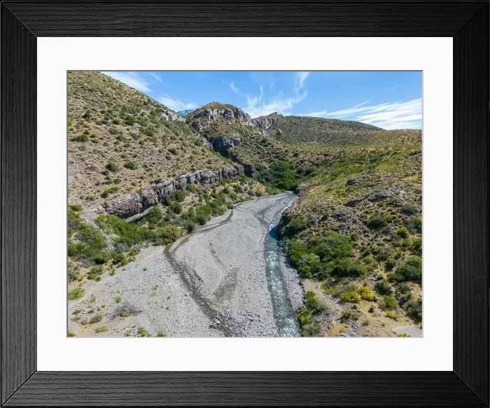 Framed Print : Aerial view of a creek running through the gorge of Quebrada El Diablo in Chile - Traveling on the Carretera Austral Framed Print : Aerial view of a creek running through the gorge of Quebrada El Diablo in Chile - Traveling on the Carretera Austral