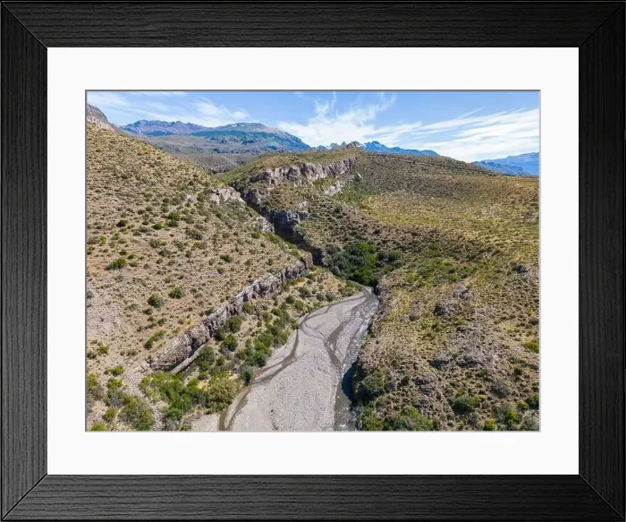 Framed Print : Aerial view of a creek running through the gorge of Quebrada El Diablo in Chile - Traveling on the Carretera Austral Framed Print : Aerial view of a creek running through the gorge of Quebrada El Diablo in Chile - Traveling on the Carretera Austral
