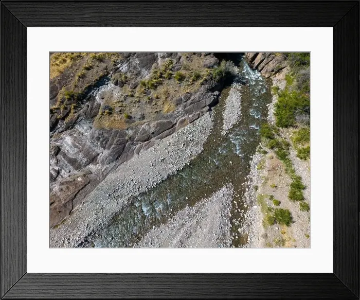 Framed Print : Aerial view of a creek running through the gorge of Quebrada El Diablo in Chile - Traveling on the Carretera Austral Framed Print : Aerial view of a creek running through the gorge of Quebrada El Diablo in Chile - Traveling on the Carretera Austral