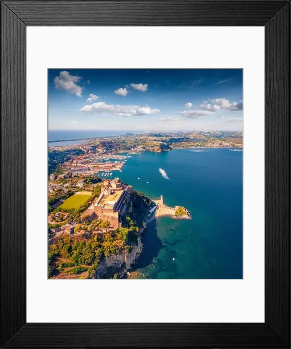 Framed Print : Captivating summer view from flying drone of Aragonese Castle of Baia Framed Print : Captivating summer view from flying drone of Aragonese Castle of Baia