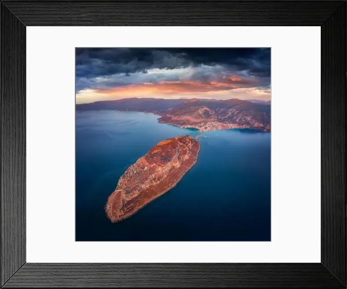 Framed Print : Dramatic summer view of Monemvasia island with Gefira town on background Framed Print : Dramatic summer view of Monemvasia island with Gefira town on background
