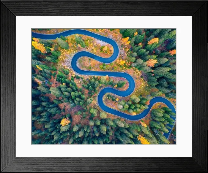 Framed Print : Aerial view of winding road in autumn forest Framed Print : Aerial view of winding road in autumn forest