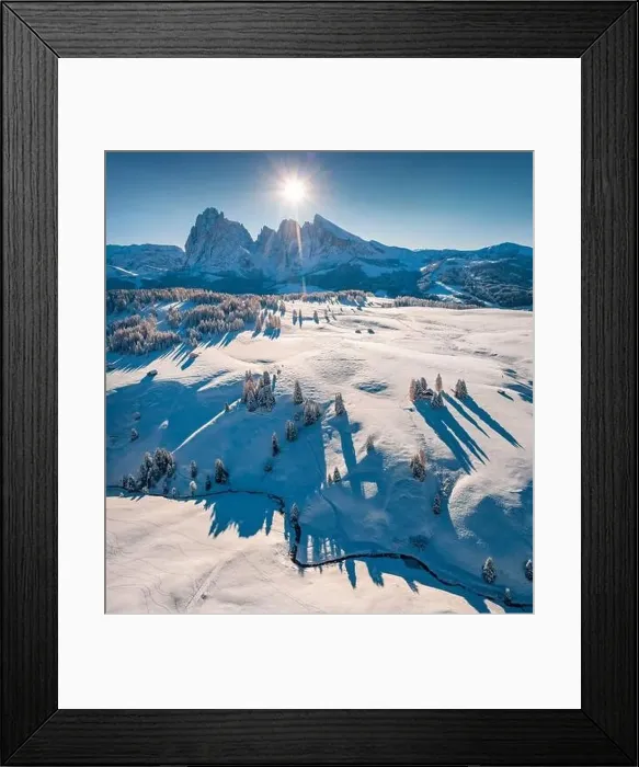 Framed Print : Astonishing view from flying drone of Alpe di Siusi village with Plattkofel peak on background Framed Print : Astonishing view from flying drone of Alpe di Siusi village with Plattkofel peak on background