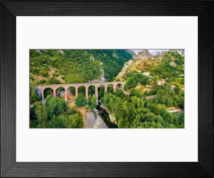 Framed Print : Fresh green view from flying drone of ancient bridge across the Devil's Throat Gorge Framed Print : Fresh green view from flying drone of ancient bridge across the Devil's Throat Gorge