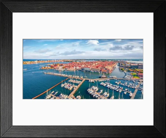 Framed Print : Breathtaking summer cityscape of Sottomarina port Framed Print : Breathtaking summer cityscape of Sottomarina port