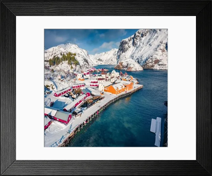 Framed Print : Aerial landscape photography. Amazing winter view from flying drone of Nusfjord town
