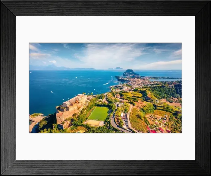 Framed Print : Astonishing view from flying drone of Aragonese Castle of Baia Framed Print : Astonishing view from flying drone of Aragonese Castle of Baia